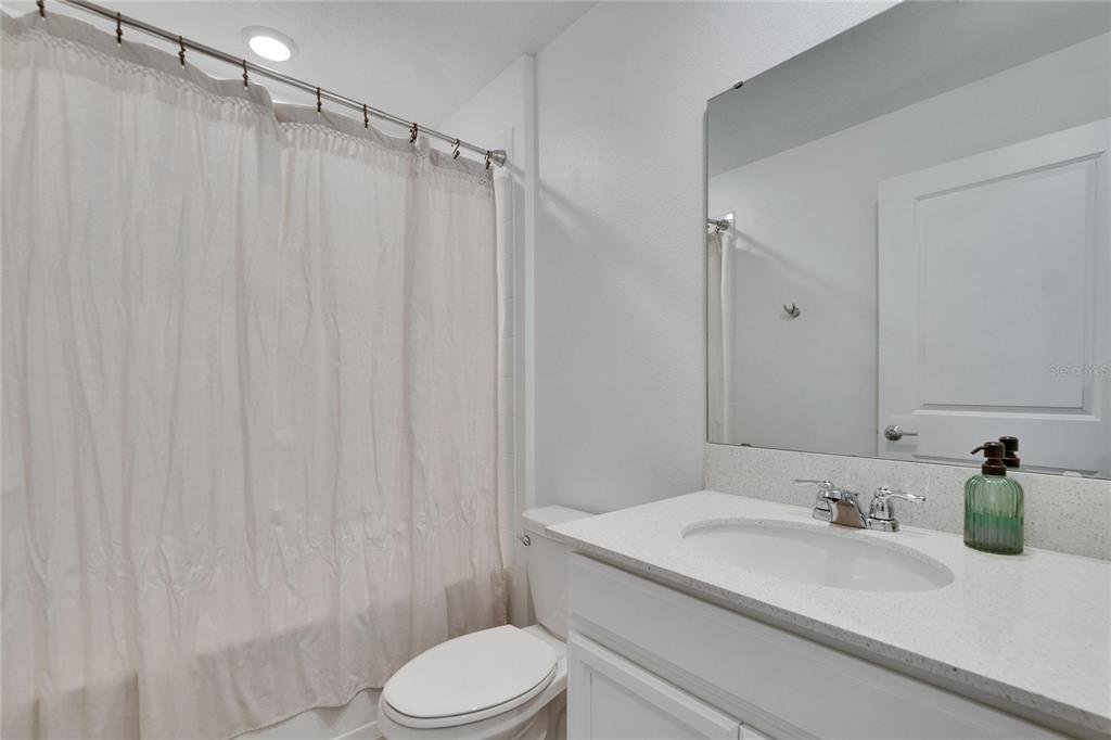 272 Pershing Street Bartow, FL 33830 - Photo 26 of 52 a bathroom with a sink toilet and shower