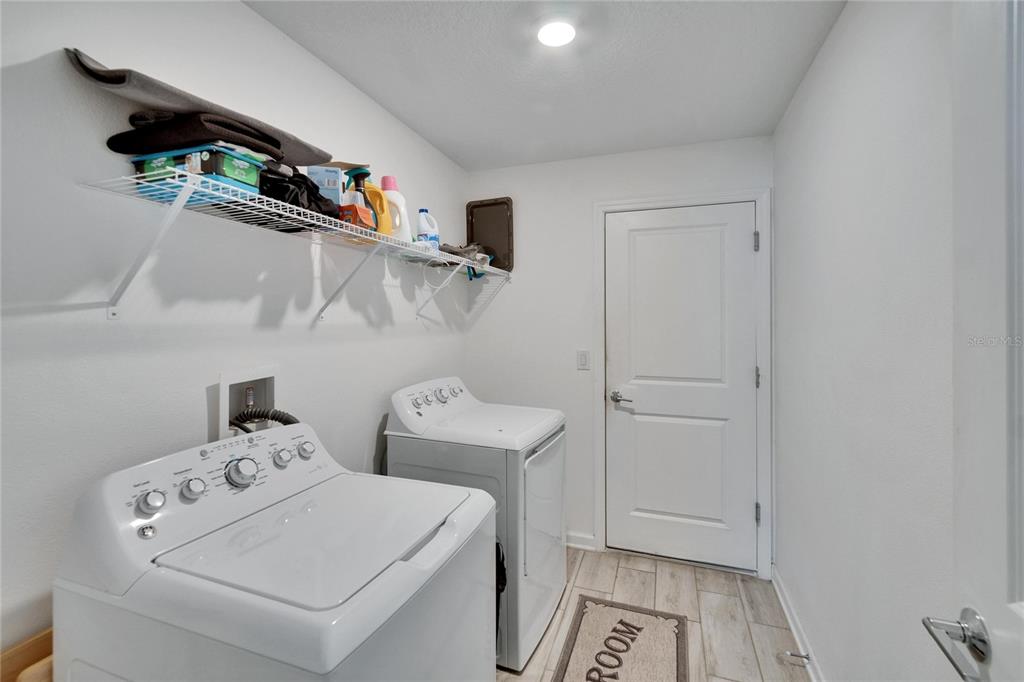 272 Pershing Street Bartow, FL 33830 - Photo 29 of 52 a utility room with dryer and washer