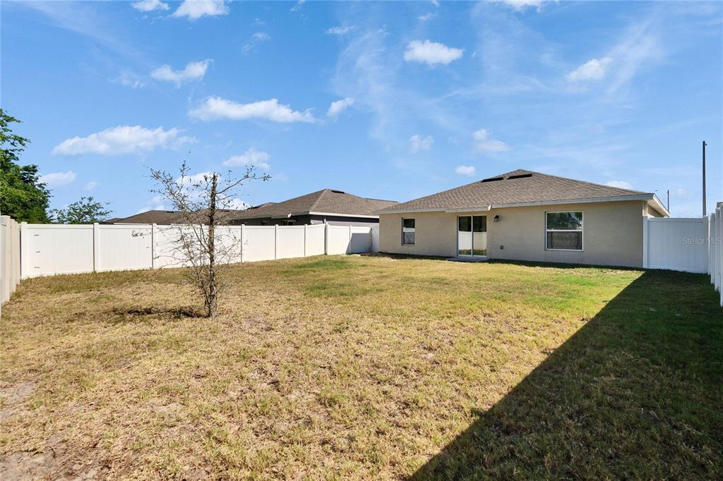 272 Pershing Street Bartow, FL 33830 - Photo 30 of 52 a house view with a garden space