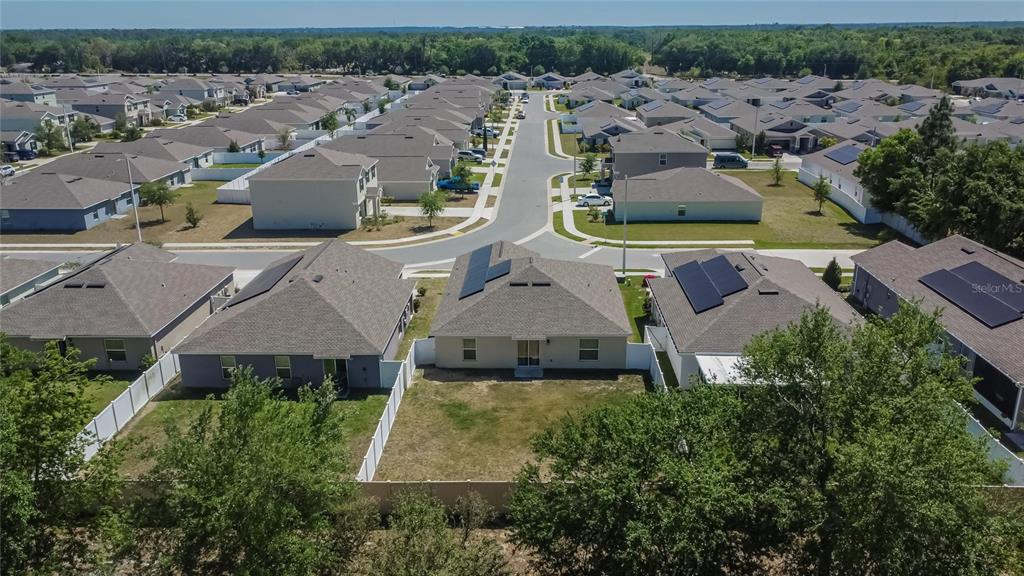 272 Pershing Street Bartow, FL 33830 - Photo 33 of 52 an aerial view of multiple houses with yard