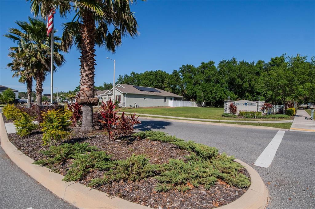 272 Pershing Street Bartow, FL 33830 - Photo 42 of 52 a view of a swimming pool with a yard