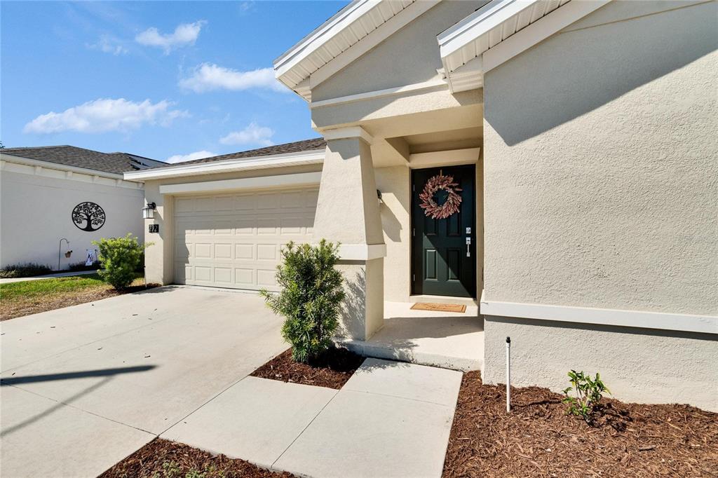 272 Pershing Street Bartow, FL 33830 - Photo 52 of 52 a front view of a house with a yard
