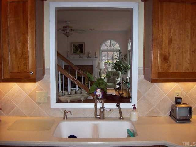109 Brandywine Drive Raleigh, NC 27607 - Photo 6 of 11 View of family room from kitchen sink