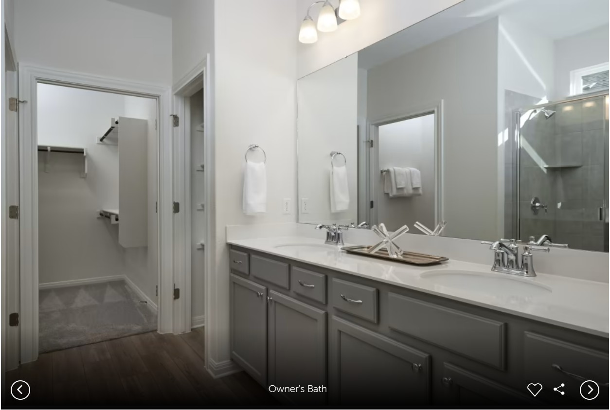 1006 Martingale Street Georgetown, TX 78633 - Photo 7 of 9 a bathroom with a double vanity sink mirror and shower
