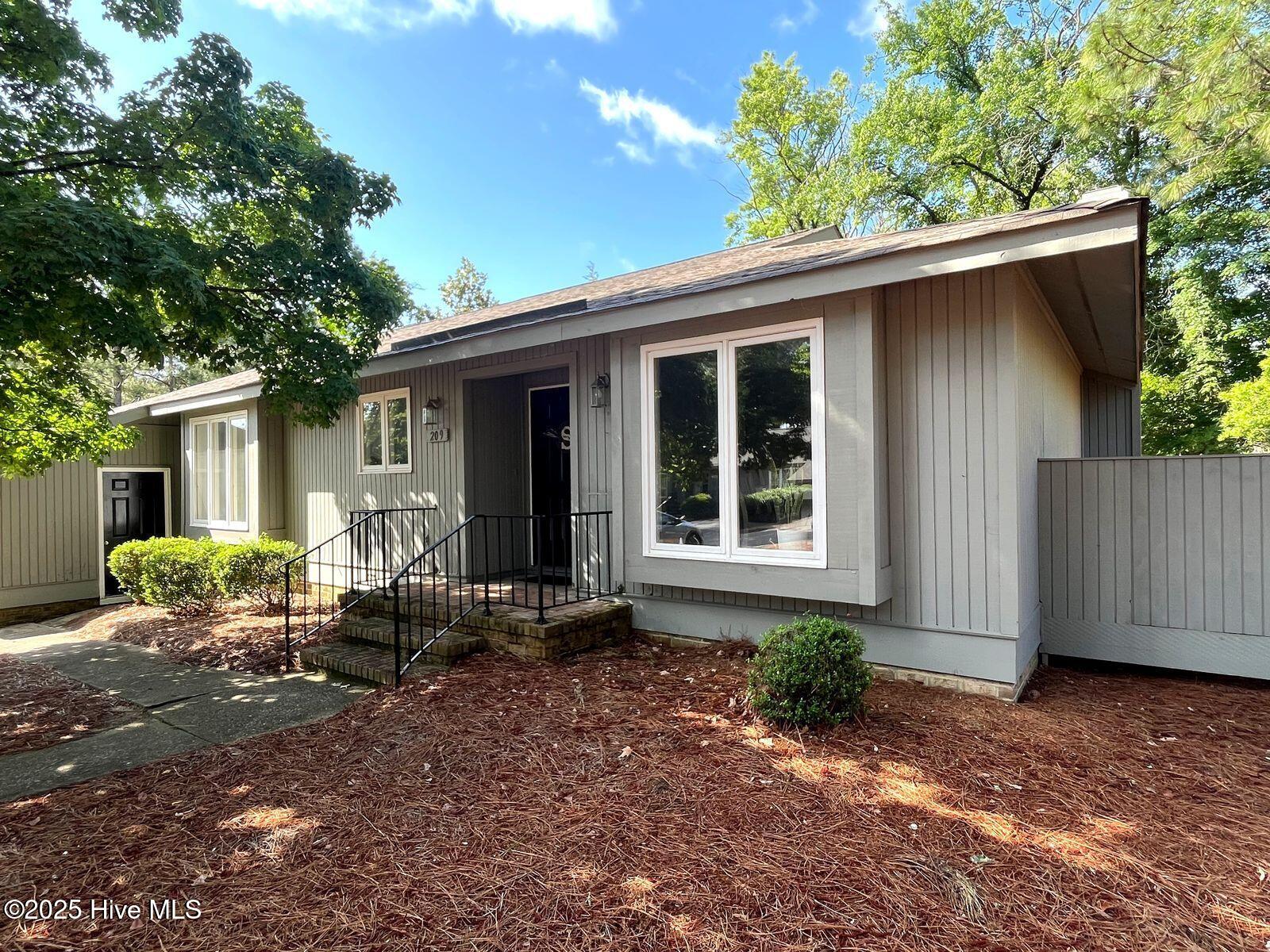 209 Tall Trees Drive Pinehurst, NC 28374 - Photo 2 of 25 209 front 2