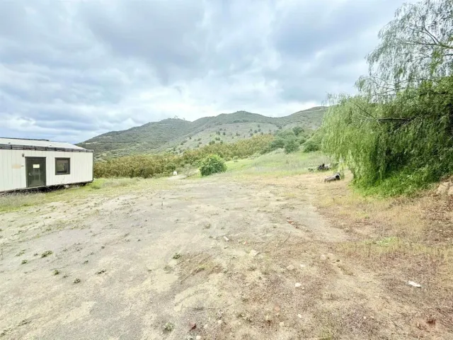 a view of an outdoor space with mountain view