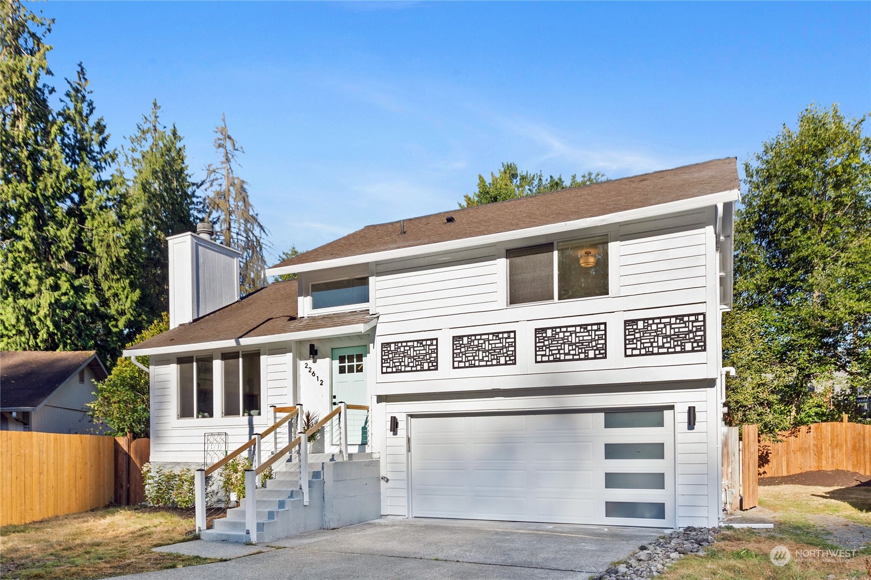 22612 20th Avenue Southeast Bothell, WA 98021 - Photo 1 of 35 a front view of a house with a tree