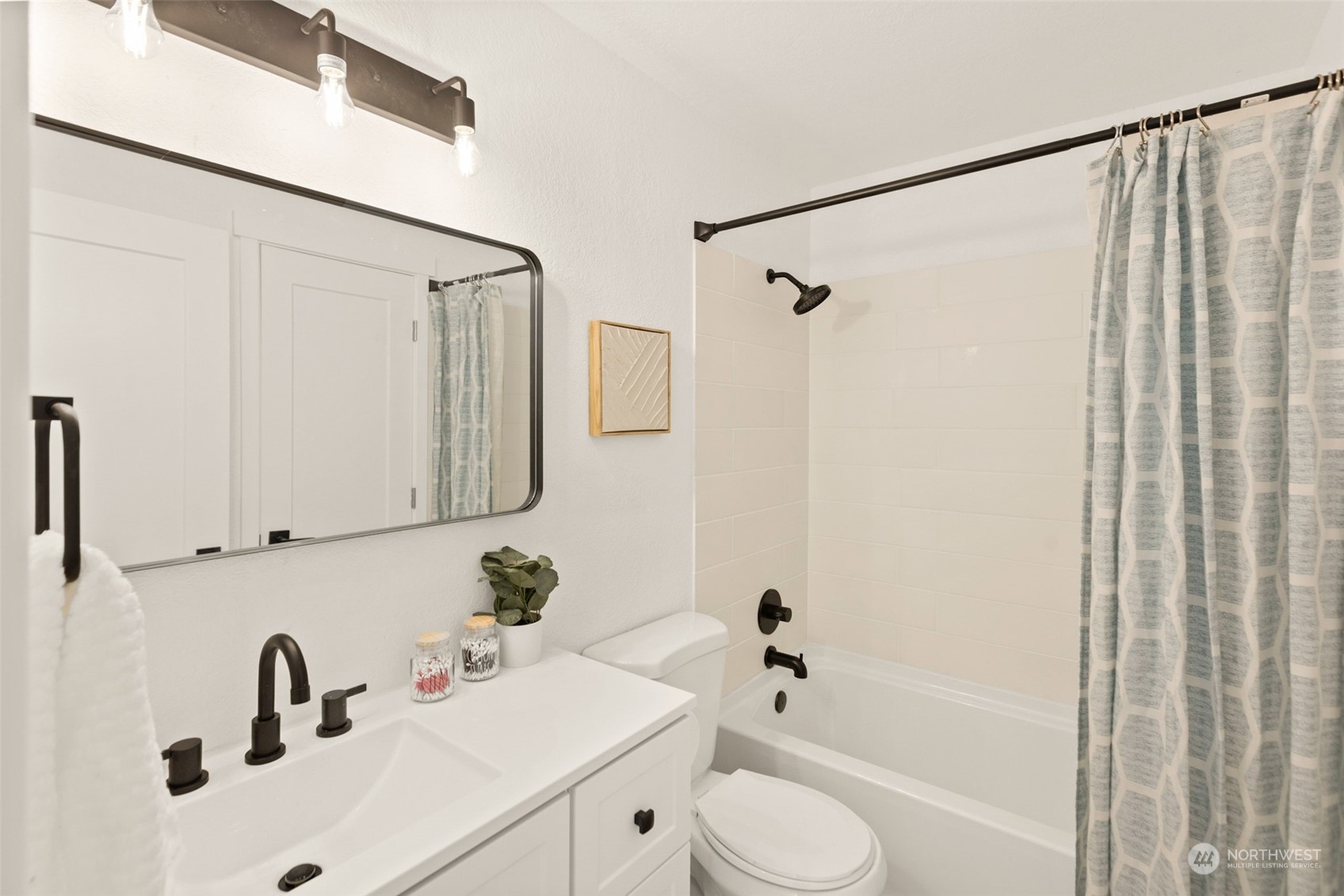 22612 20th Avenue Southeast Bothell, WA 98021 - Photo 18 of 35 a bathroom with a sink a toilet and shower