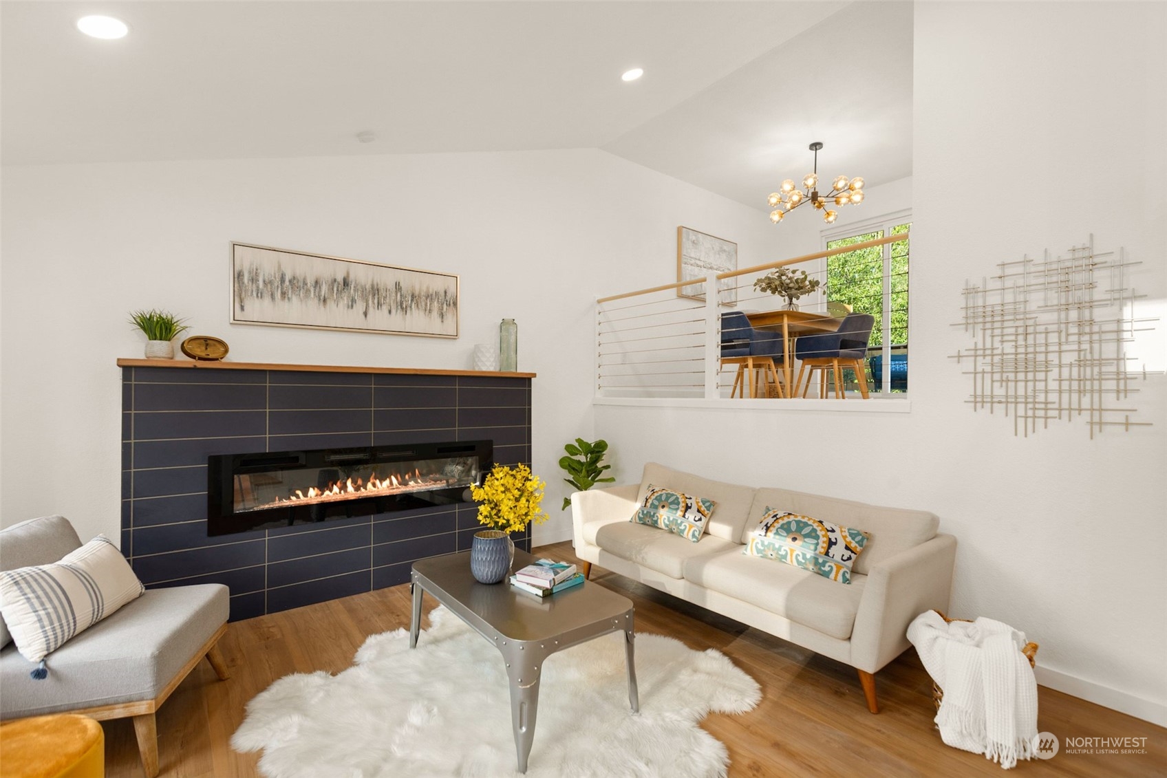 22612 20th Avenue Southeast Bothell, WA 98021 - Photo 3 of 35 a living room with furniture and a fireplace