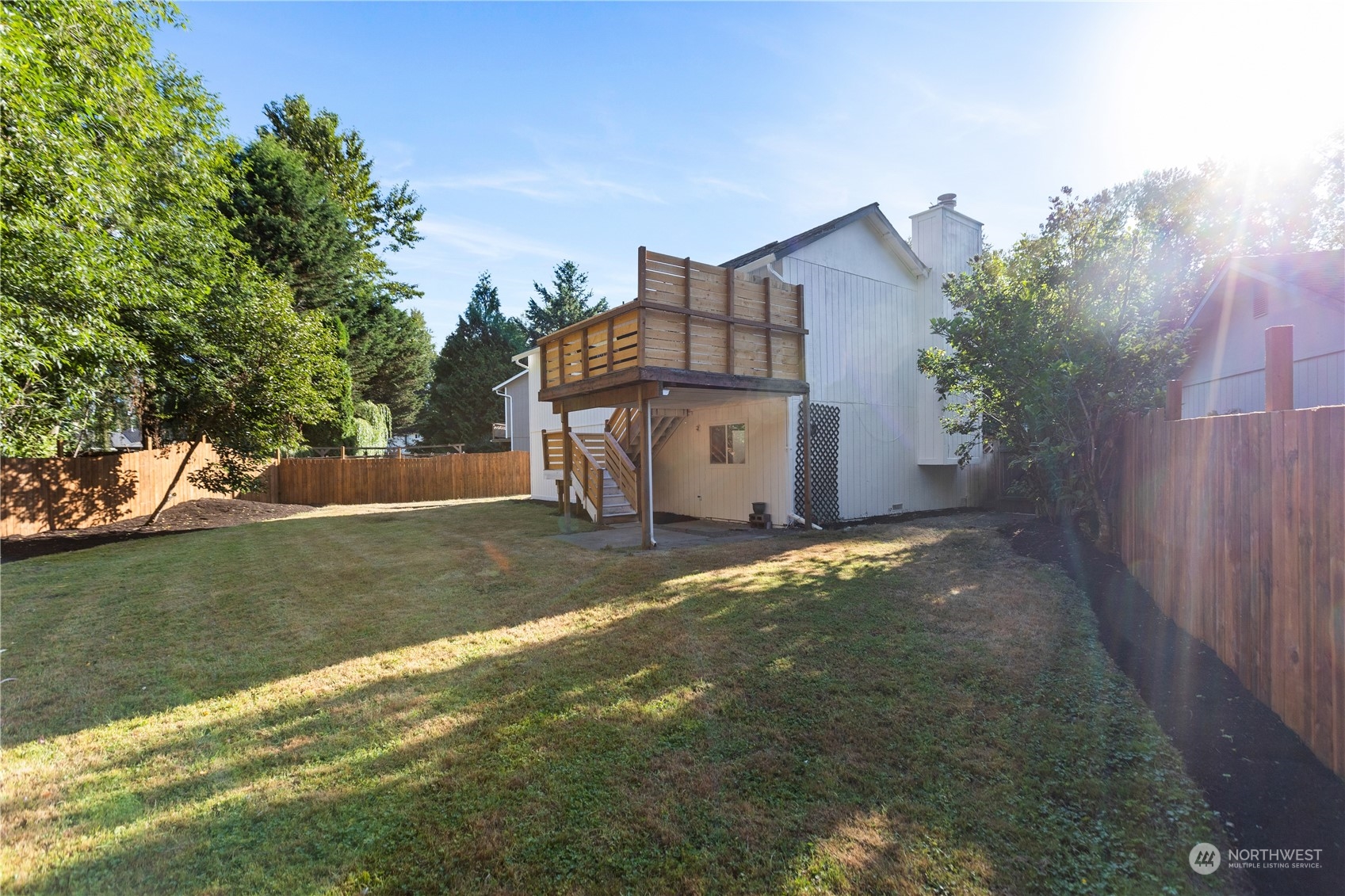 22612 20th Avenue Southeast Bothell, WA 98021 - Photo 31 of 35 a view of a house with a yard and garage