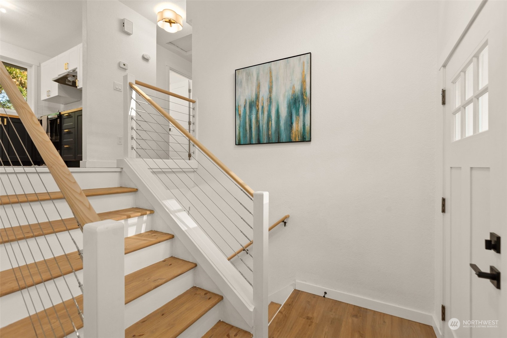 22612 20th Avenue Southeast Bothell, WA 98021 - Photo 6 of 35 a view of staircase with white walls and a window
