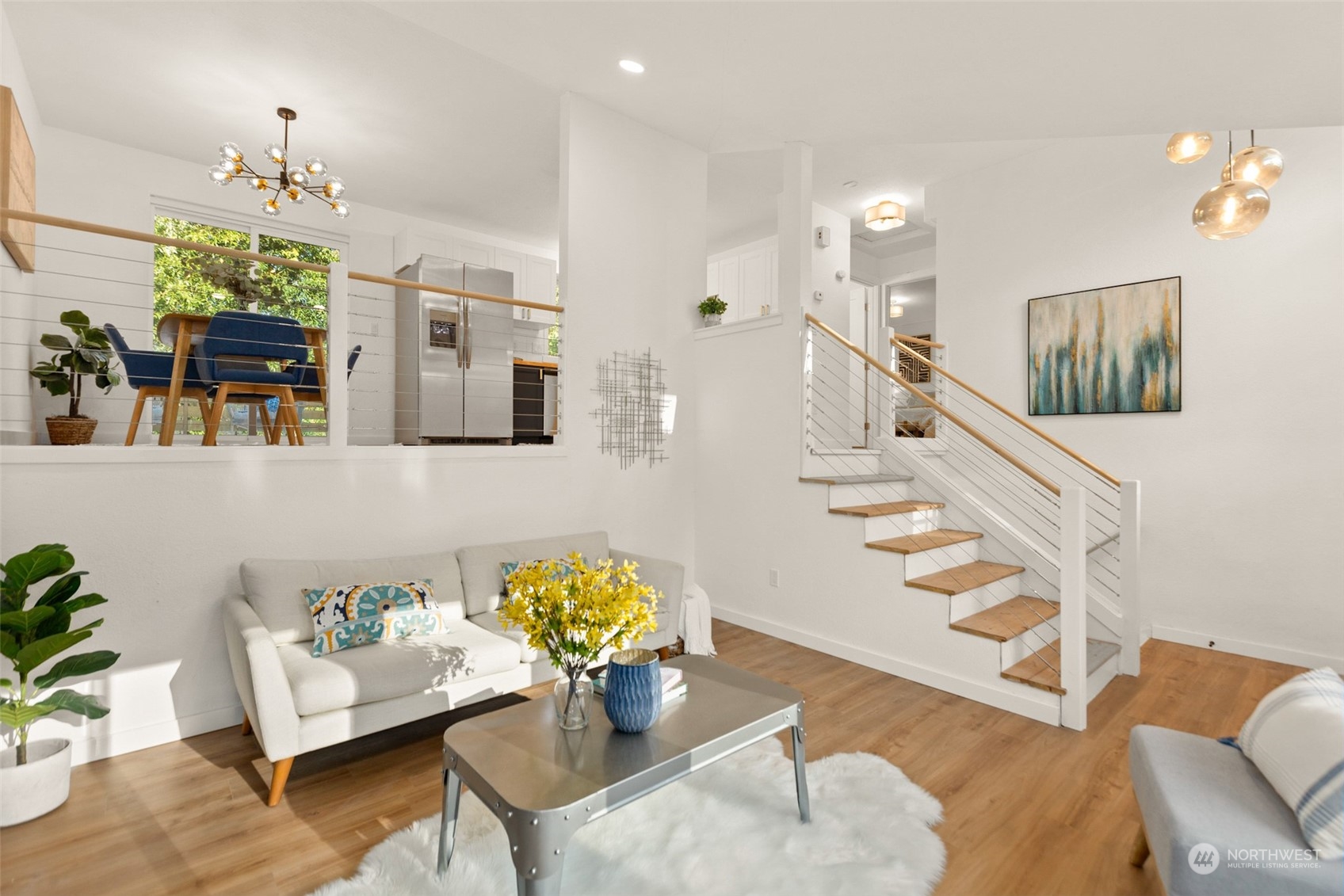 22612 20th Avenue Southeast Bothell, WA 98021 - Photo 8 of 35 a living room with furniture and chandelier
