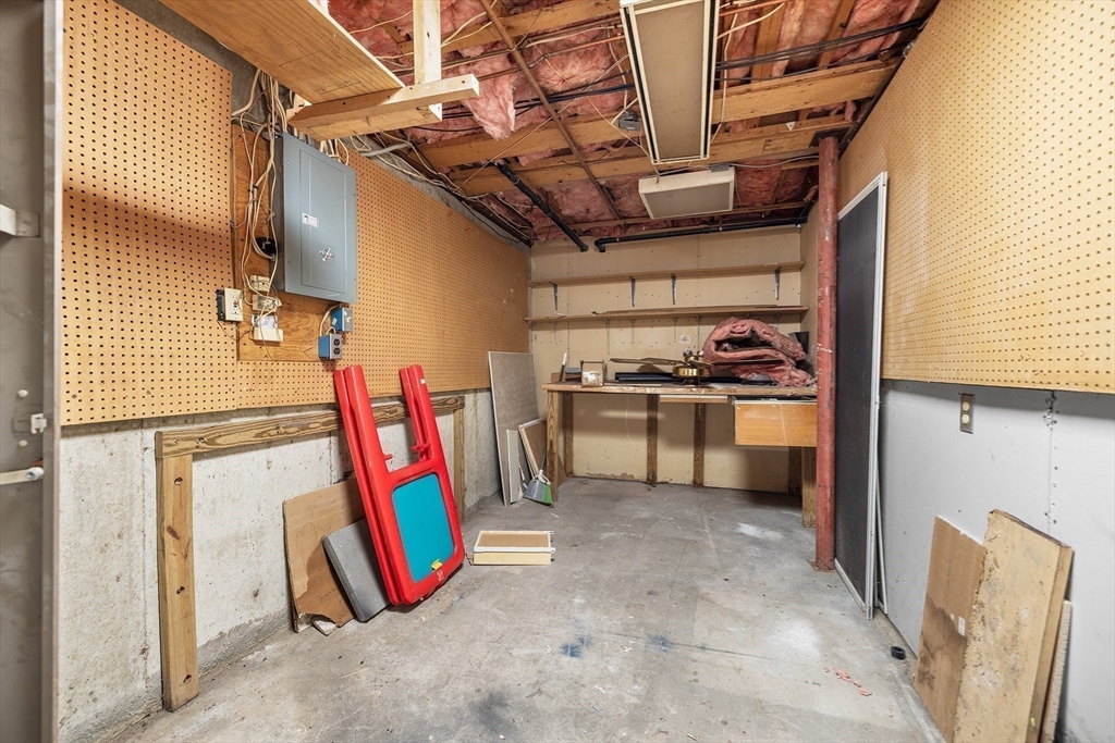 22 Pleasant Street, Unit D Lawrence, MA 01841 - Photo 25 of 32 a view of storage and utility room with washer and dryer