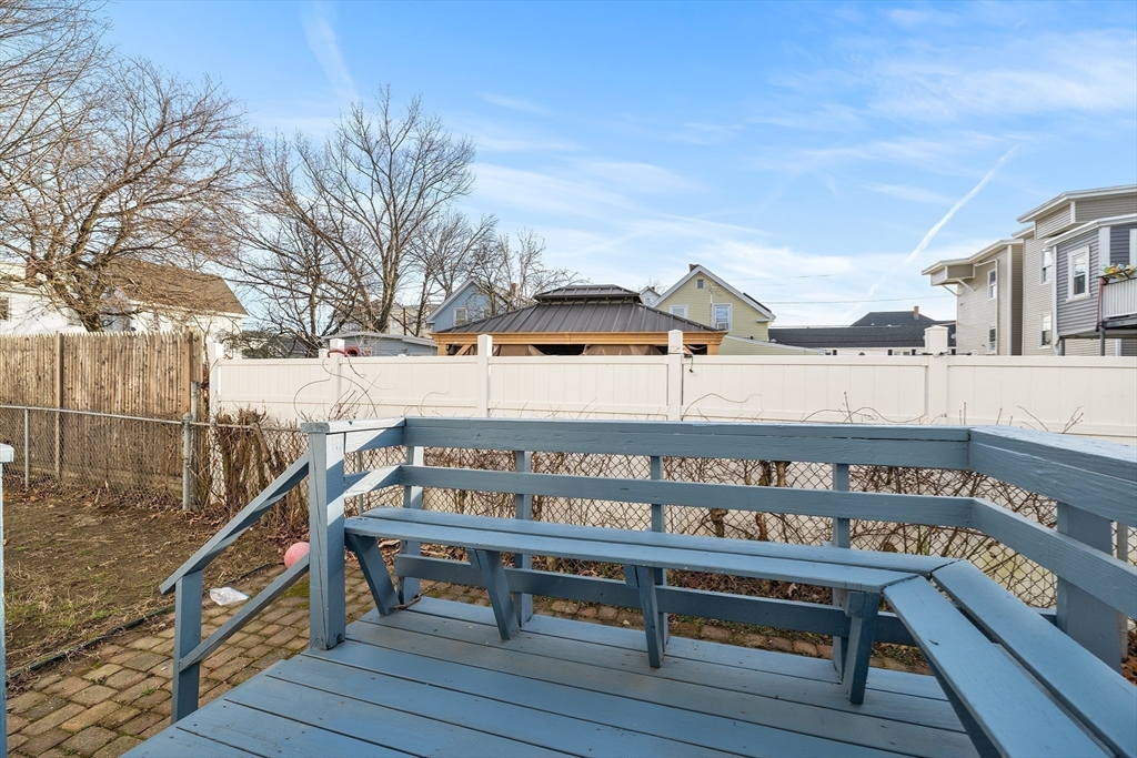 22 Pleasant Street, Unit D Lawrence, MA 01841 - Photo 26 of 32 a view of a bench in balcony