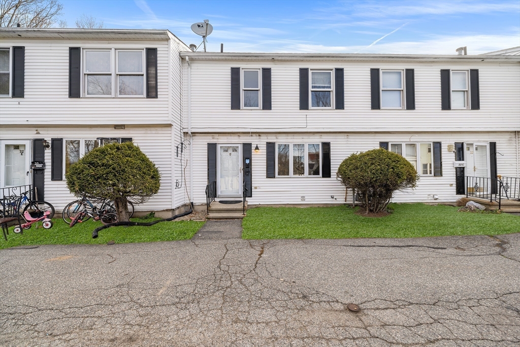 22 Pleasant Street, Unit D Lawrence, MA 01841 - Photo 30 of 32 a house view with a garden space