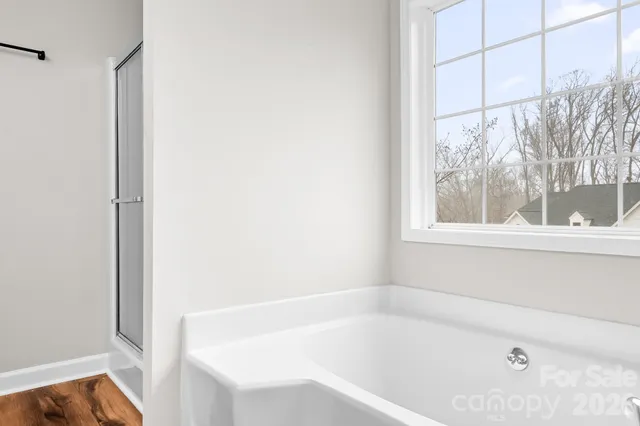 a bathroom with a sink toilet and a mirror