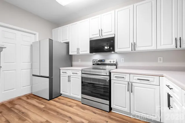 a view of a sink from a hallway