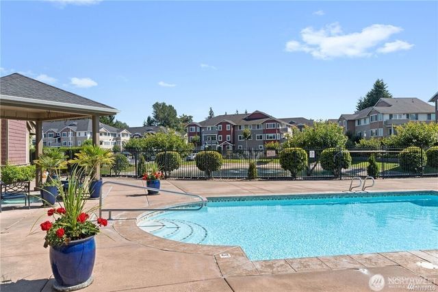 a view of a living room and dining room