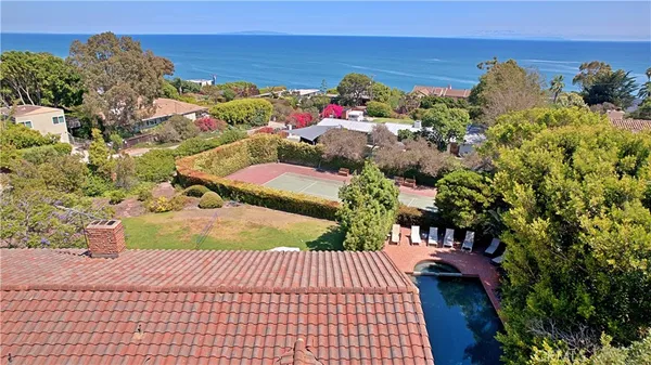 a view of a yard with an outdoor space