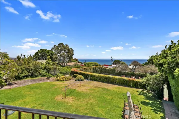 a view of a lake with a big yard