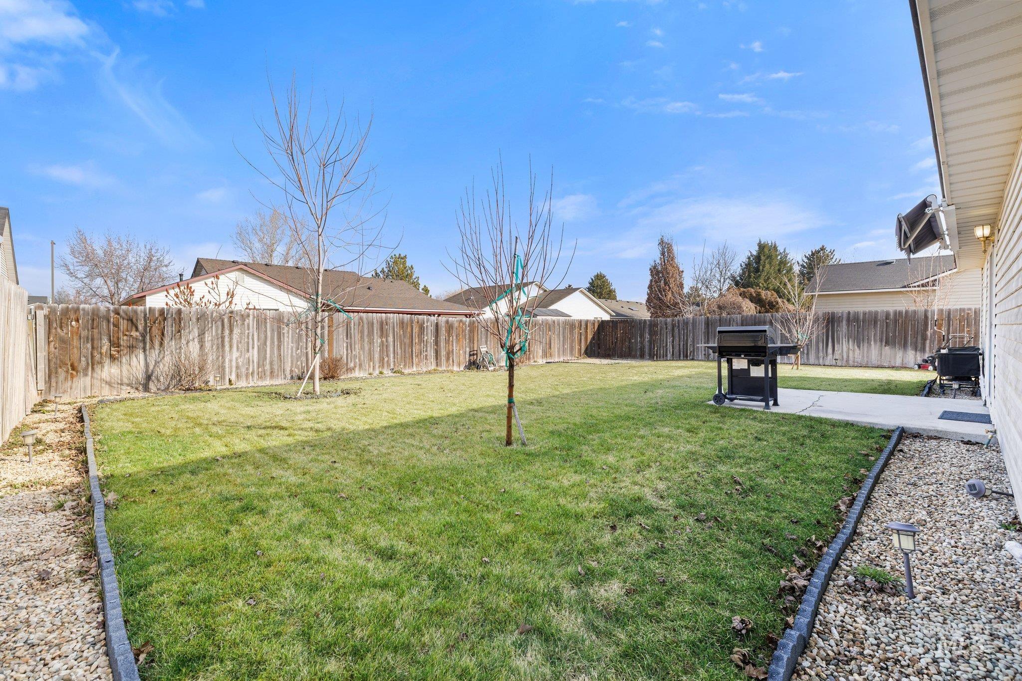 14250 Blue Ridge Street Caldwell, ID 83607 - Photo 28 of 33 Fenced backyard featuring a patio