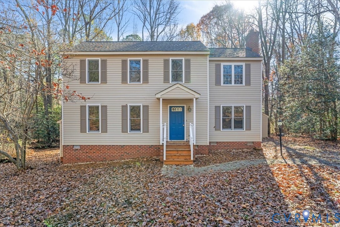 2739 Ridgeview Road Powhatan, VA 23139 - Photo 33 of 42 a front view of a house with a garden