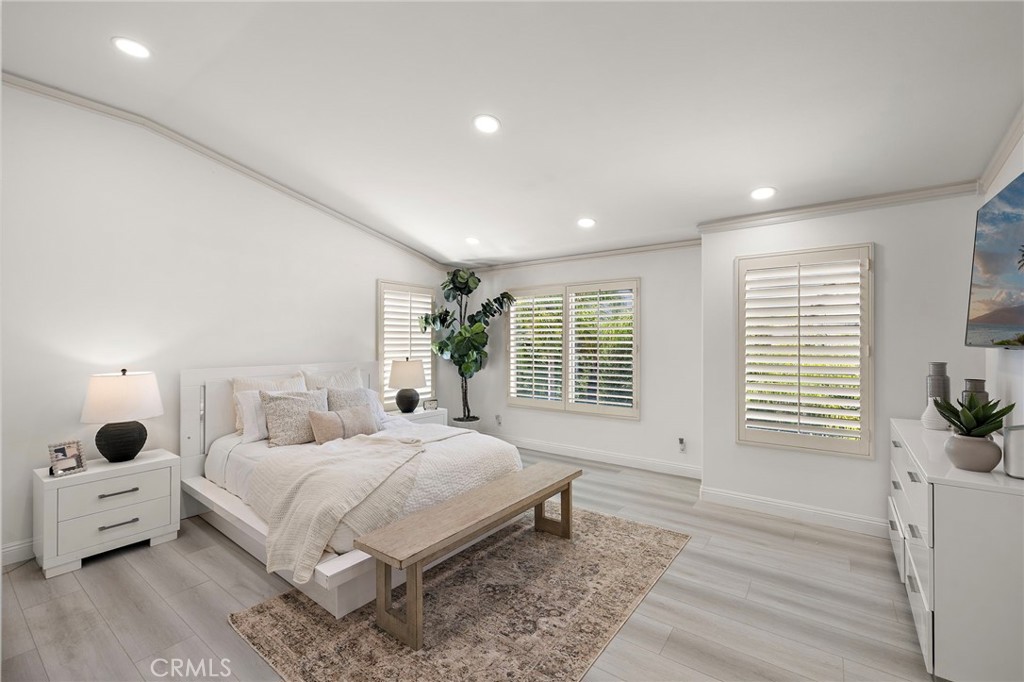 11625 Allen Tustin, CA 92782 - Photo 25 of 45 a bedroom with a bed and a large window