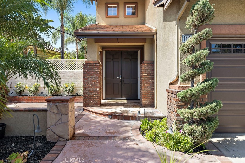 11625 Allen Tustin, CA 92782 - Photo 34 of 45 a front view of a house with a yard