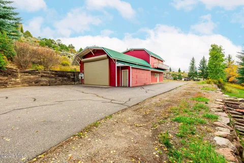 a view of a yard with an umbrella