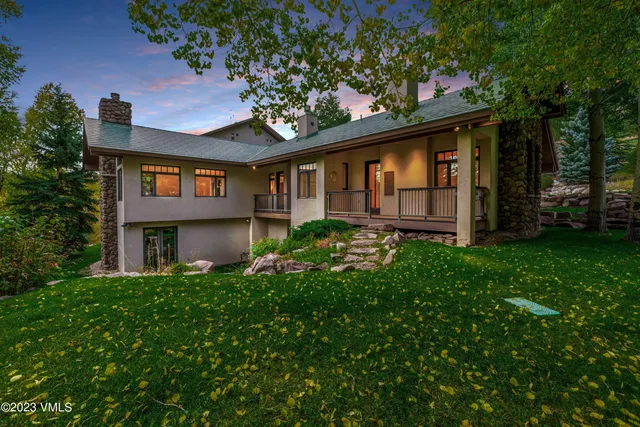 front view of house with a big yard