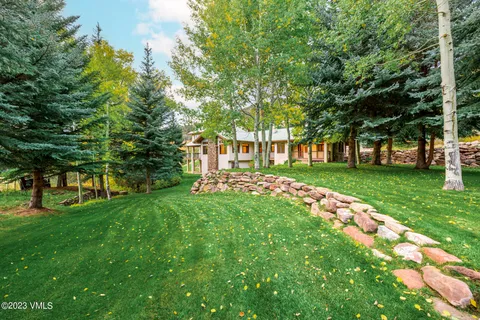 a garden view with a fountain