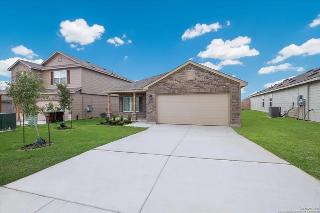 a front view of house with yard