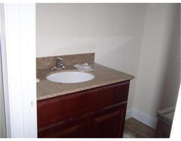 Lot 29 Bronson Street Fall River, MA 02721 - Photo 5 of 5 a bathroom with a sink and a mirror