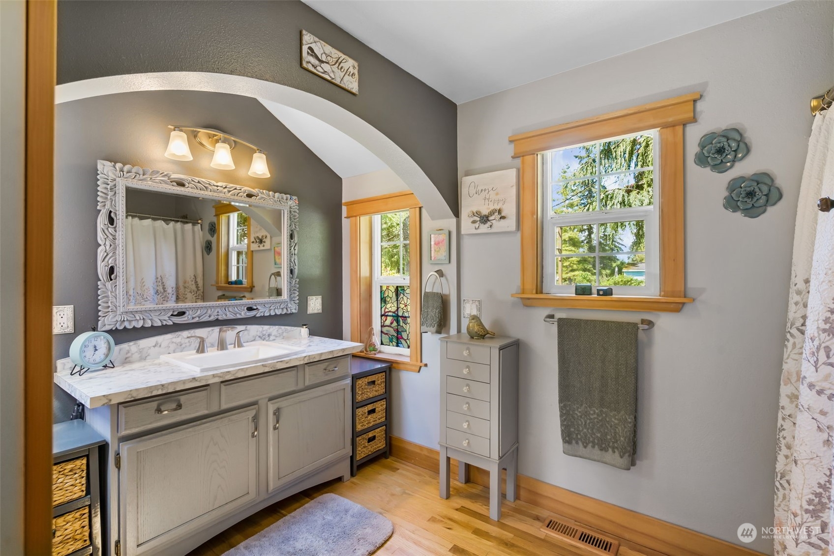 916 McLeod Road Bellingham, WA 98226 - Photo 15 of 40 a spacious bathroom with a double vanity sink and a mirror