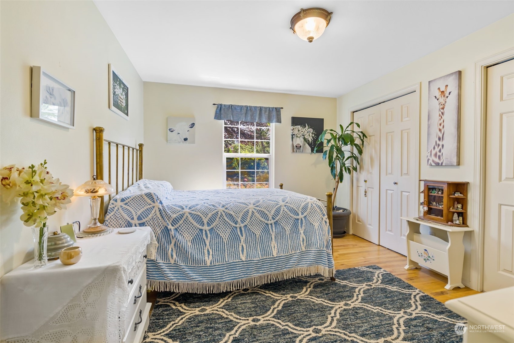 916 McLeod Road Bellingham, WA 98226 - Photo 17 of 40 a bed sitting in a bedroom next to a window