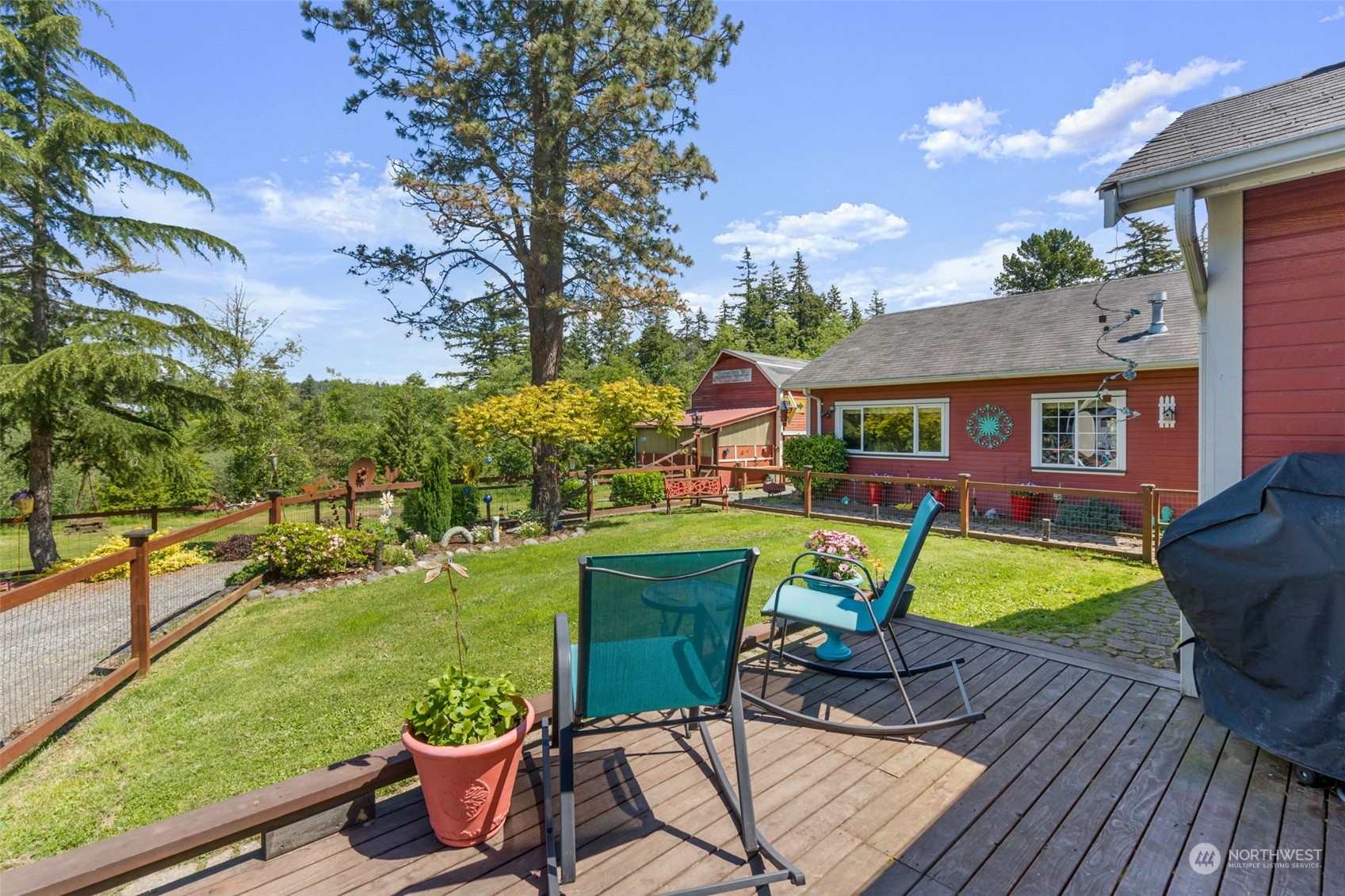 916 McLeod Road Bellingham, WA 98226 - Photo 22 of 40 a view of a chair and table on the roof deck