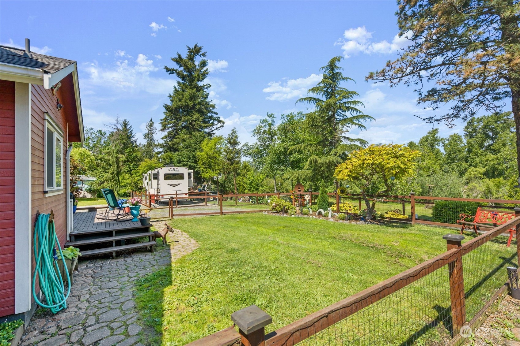 916 McLeod Road Bellingham, WA 98226 - Photo 23 of 40 a view of a backyard with sitting area