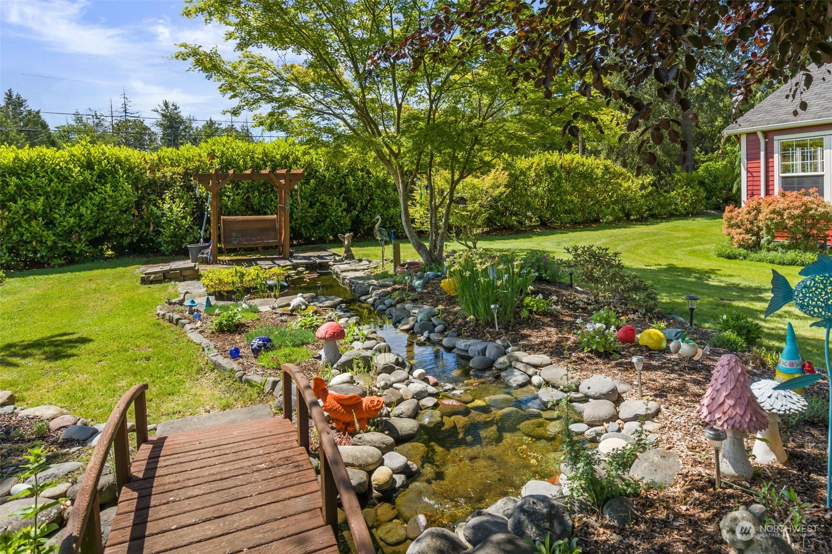 916 McLeod Road Bellingham, WA 98226 - Photo 25 of 40 a view of a chairs and table in a garden