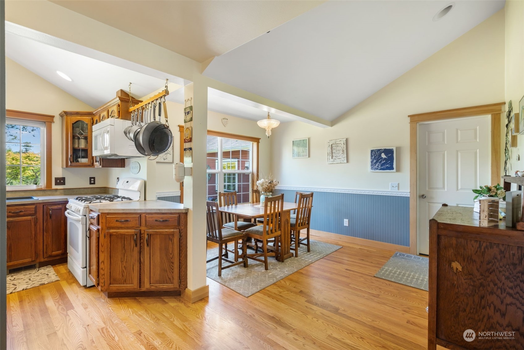 916 McLeod Road Bellingham, WA 98226 - Photo 5 of 40 a living room with granite countertop furniture a dining table and wooden floor