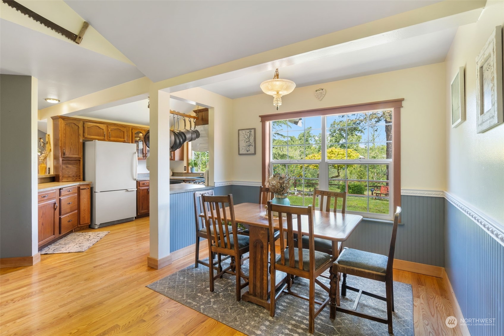 916 McLeod Road Bellingham, WA 98226 - Photo 8 of 40 a view of a dining room with furniture and windows