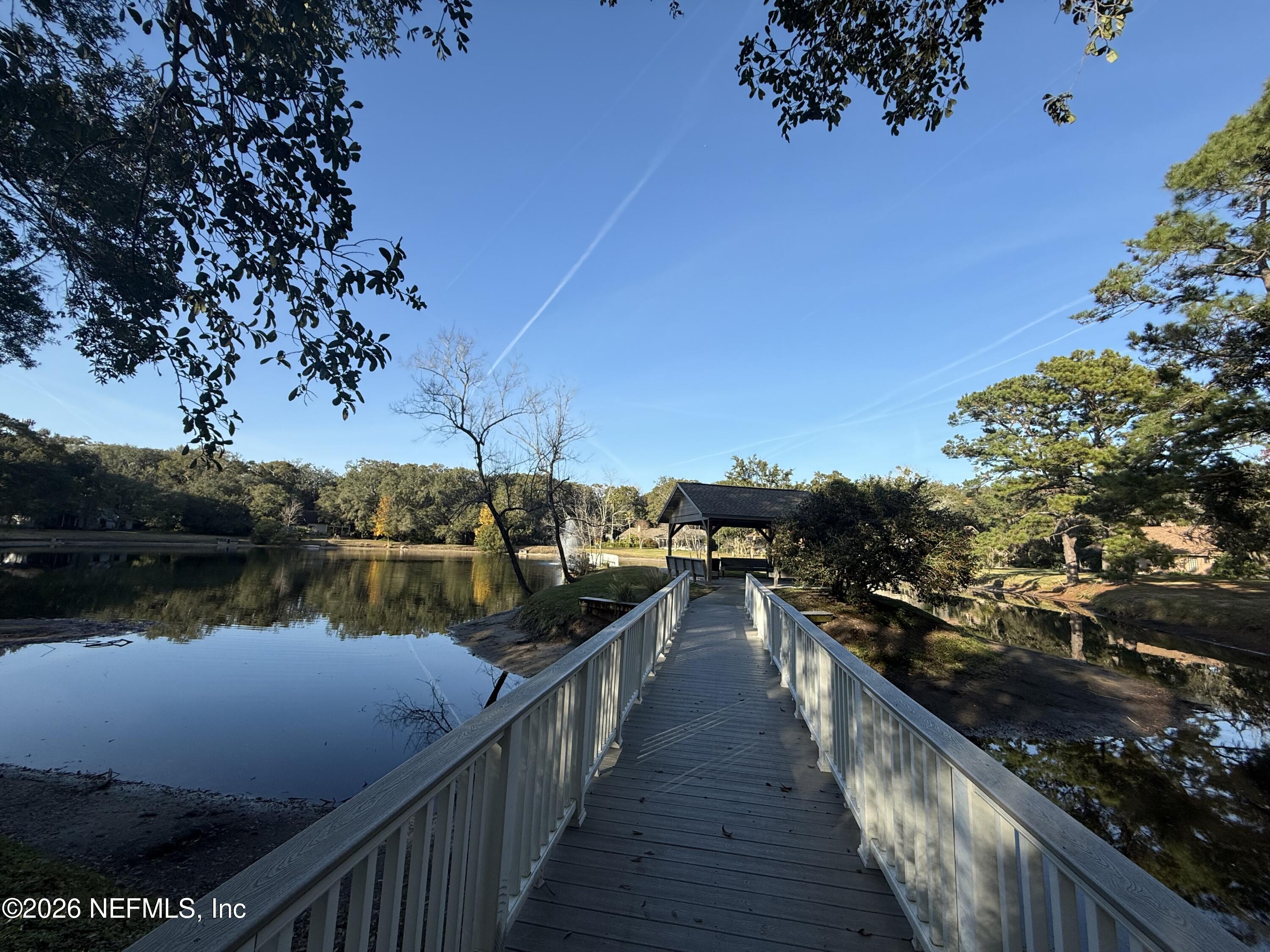 12223 Springmoor One Court Jacksonville, FL 32225 - Photo 27 of 29 a view of a balcony with chairs