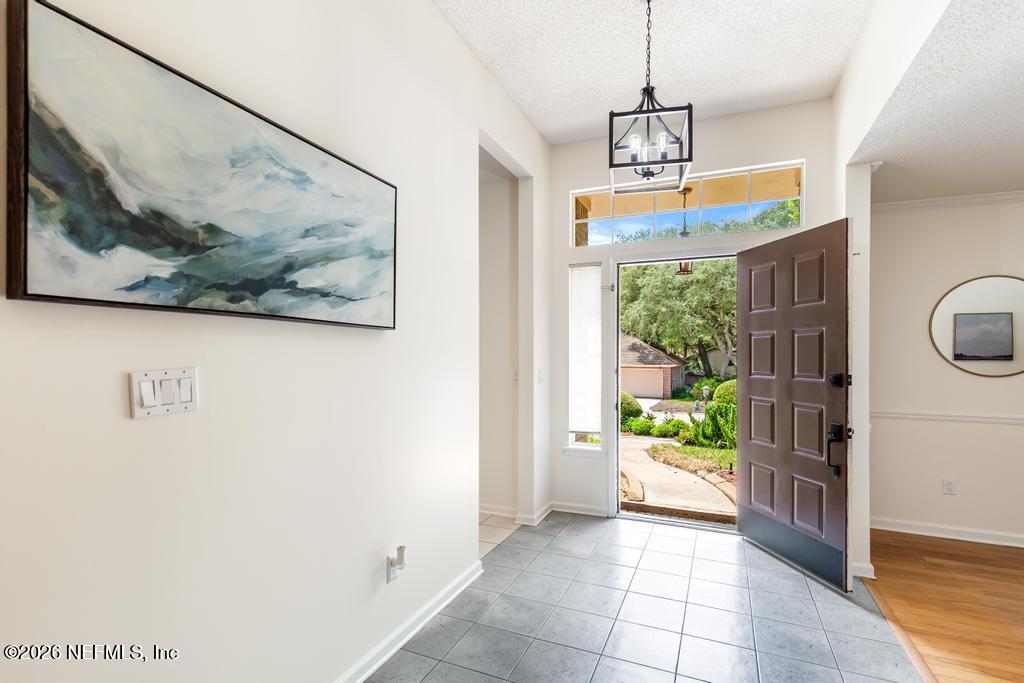 12223 Springmoor One Court Jacksonville, FL 32225 - Photo 4 of 29 a dining room with furniture and window