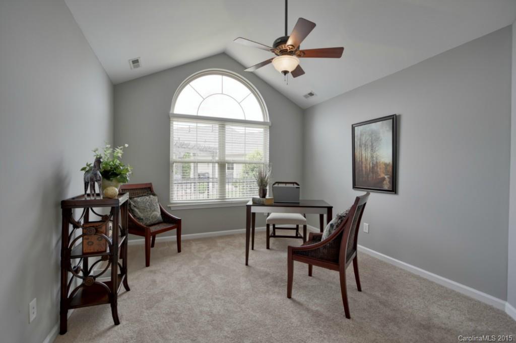 725 Ledgestone Court, Unit 725 Fort Mill, SC 29708 - Photo 14 of 24 a workspace with wooden floor and a window