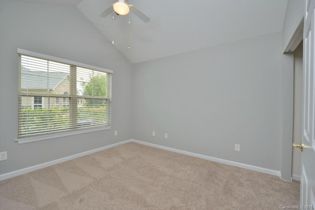 725 Ledgestone Court, Unit 725 Fort Mill, SC 29708 - Photo 22 of 24 a view of an empty room with a window
