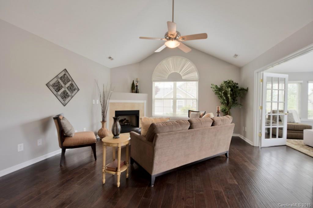 725 Ledgestone Court, Unit 725 Fort Mill, SC 29708 - Photo 8 of 24 a living room with furniture fireplace and window