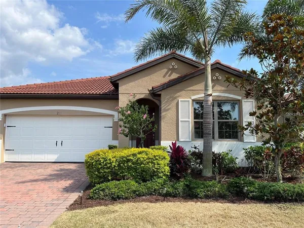 front view of a house with a small yard