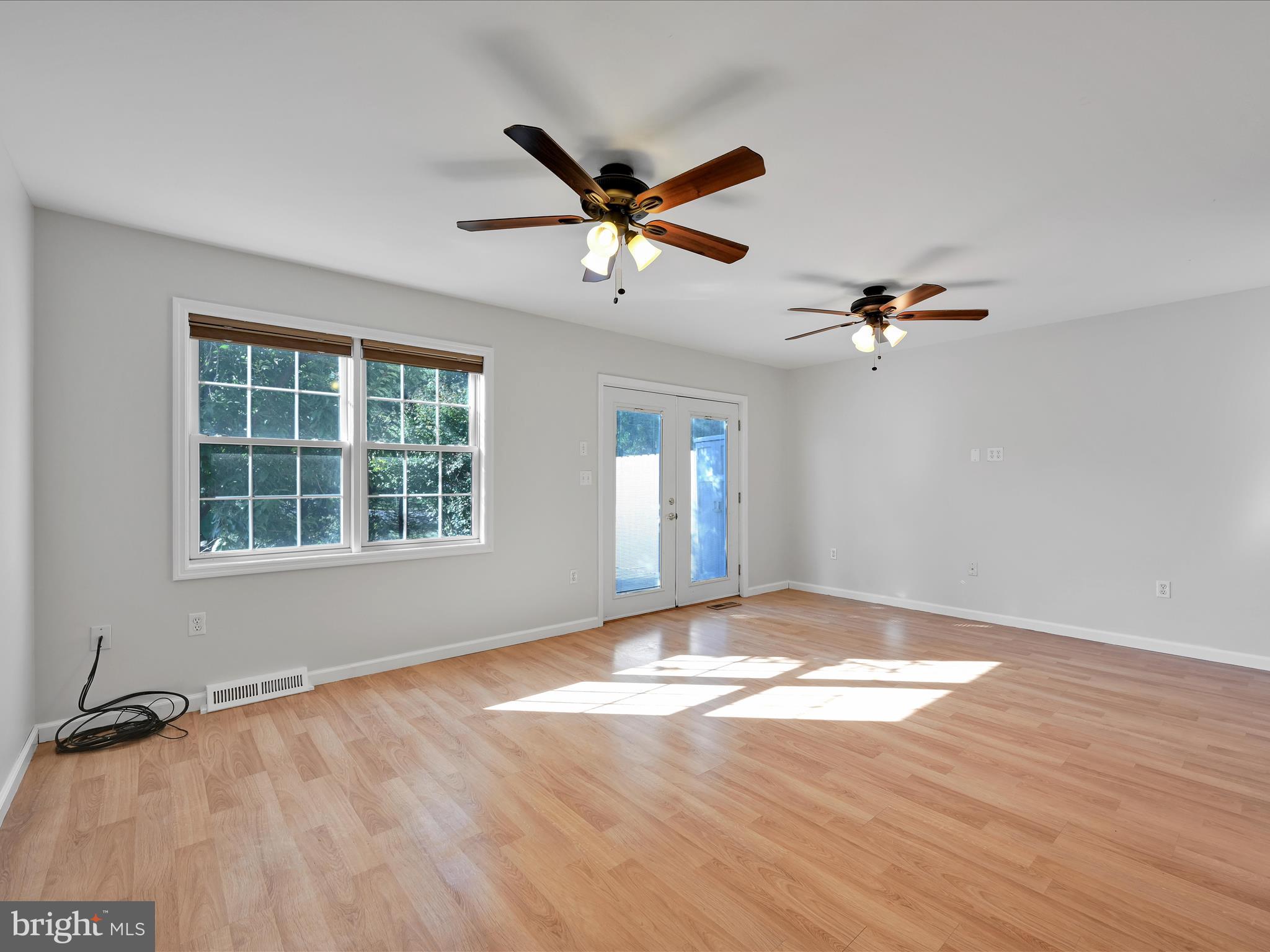 70 Pebble Creek Drive Lititz, PA 17543 - Photo 12 of 26 a view of a livingroom with a ceiling fan and window