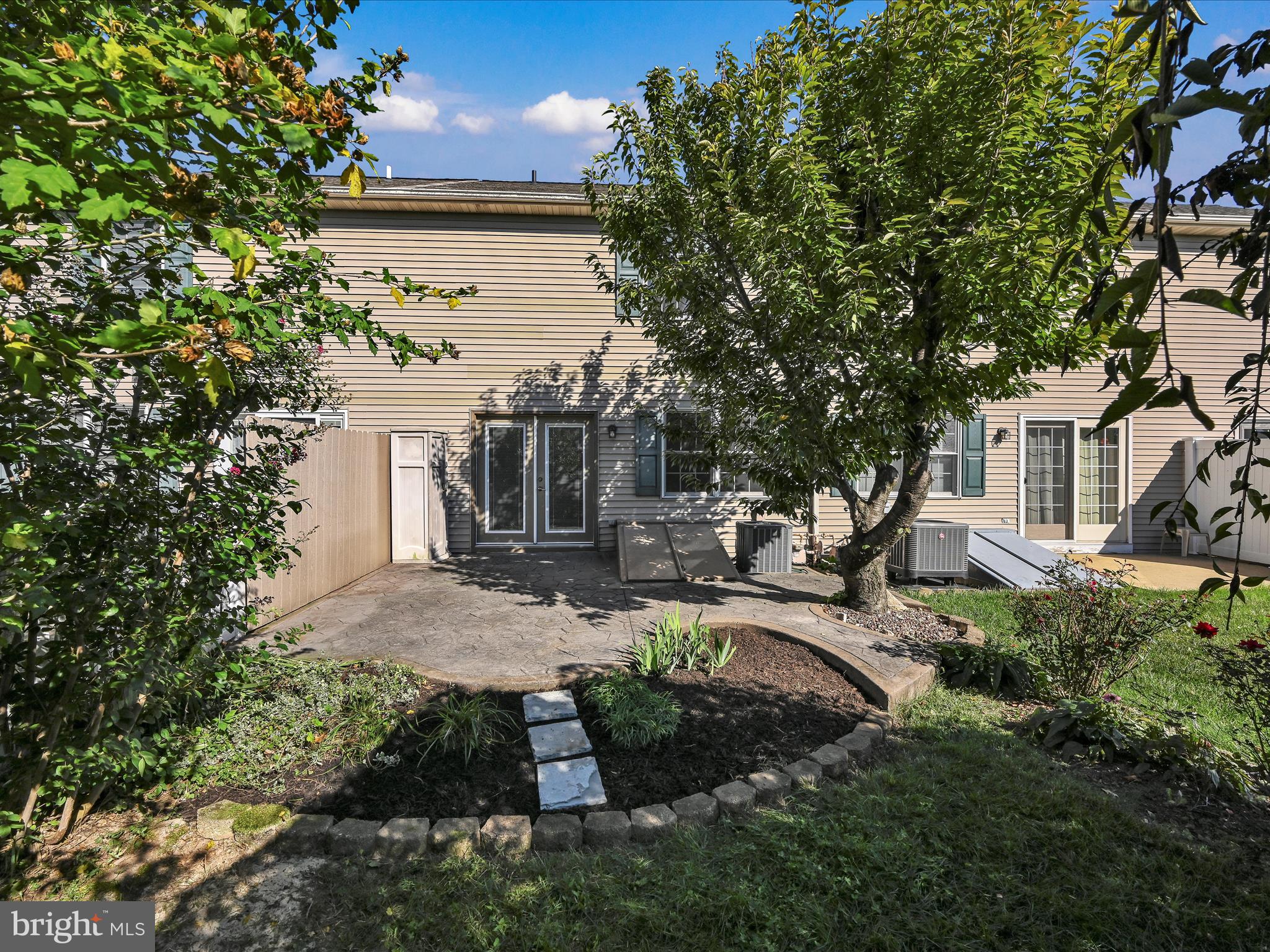 70 Pebble Creek Drive Lititz, PA 17543 - Photo 23 of 26 a view of a house with backyard and sitting area