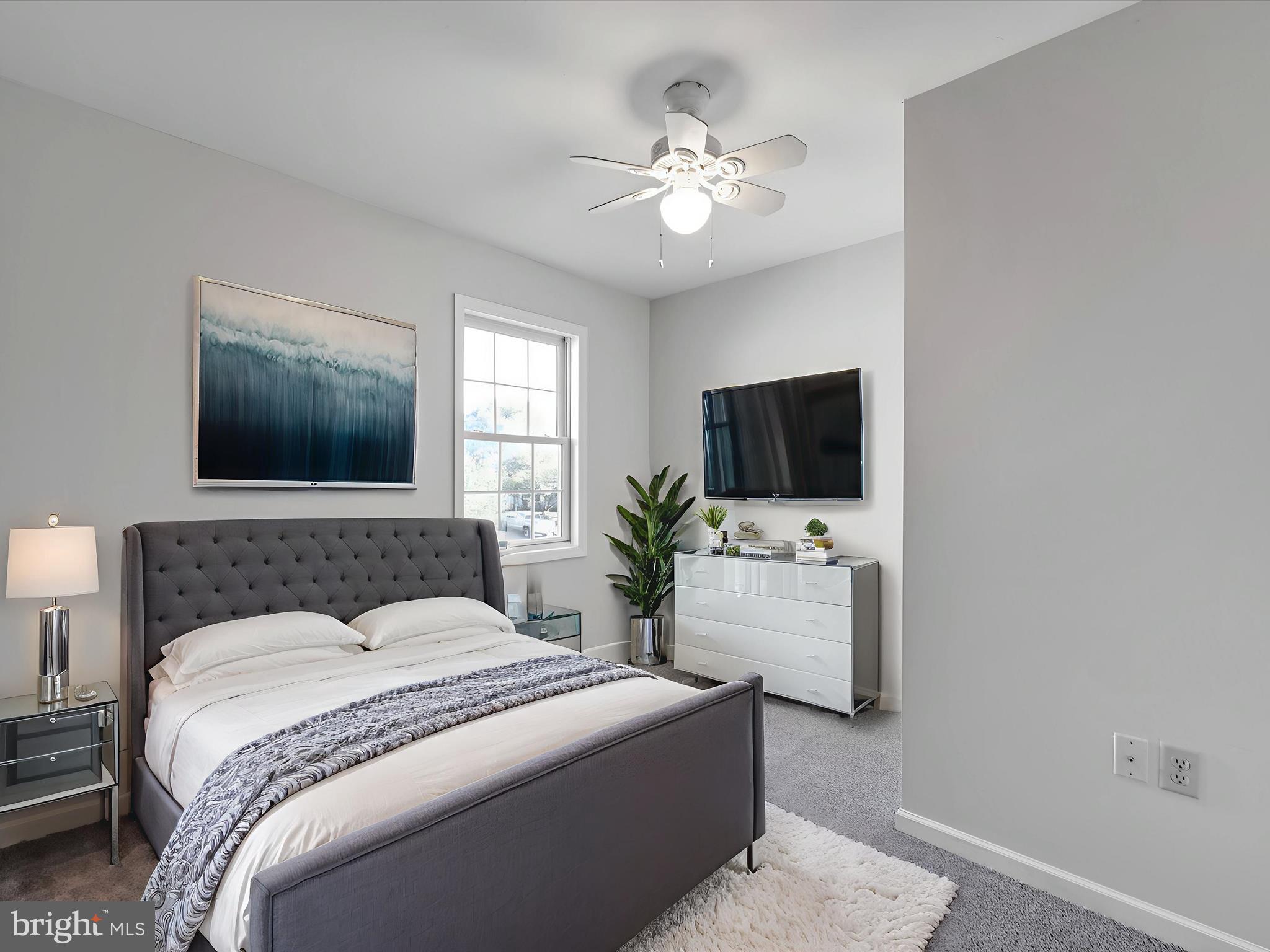 70 Pebble Creek Drive Lititz, PA 17543 - Photo 7 of 26 a bedroom with a bed and a flat screen tv