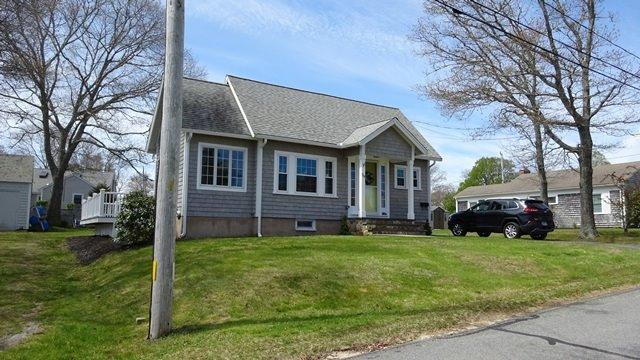 54 Jefferson Shores Road Buzzards Bay, MA 02532 - Photo 1 of 28 a front view of house with yard and green space